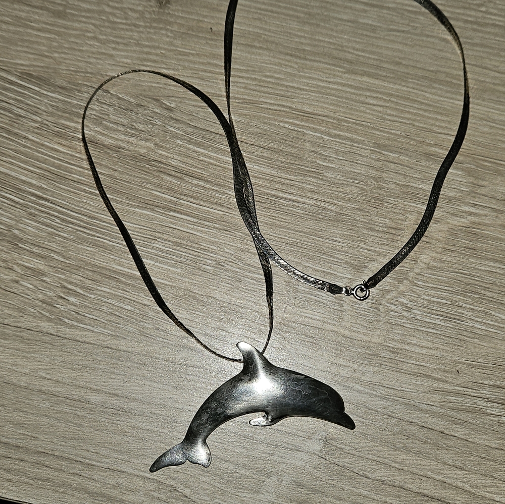 Sterling Silver Dolphin Pendant/Necklace with a Sterling Silver Chain.